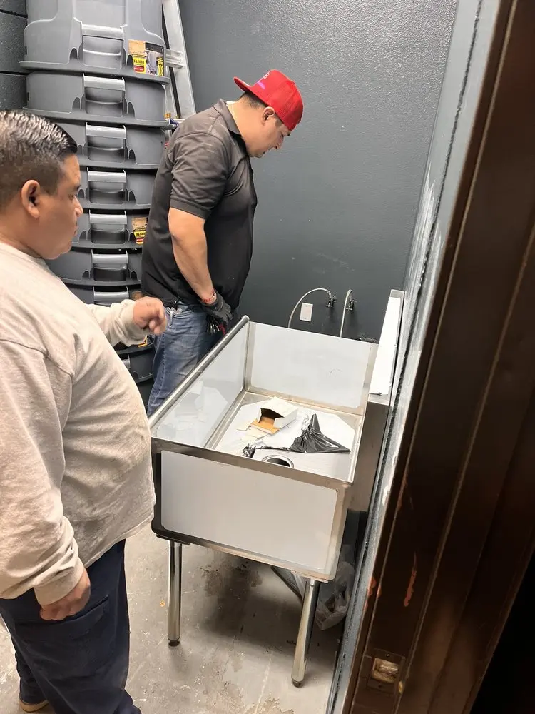 Commercial plumbing and sink installation in Maynard